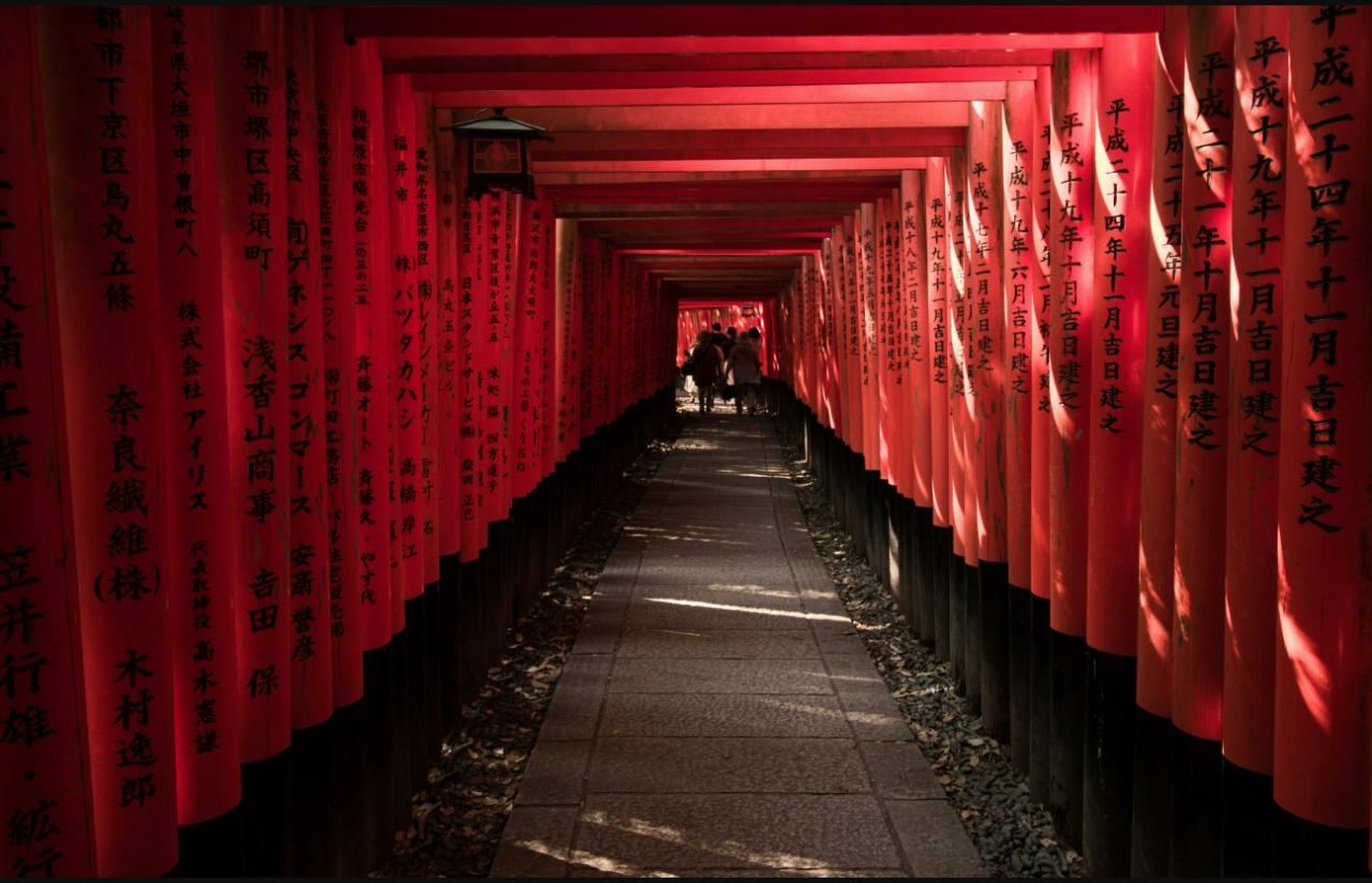 The senbon torii — thousands of vermillion gates — at Fushimi Inari Shrine, Kyoto