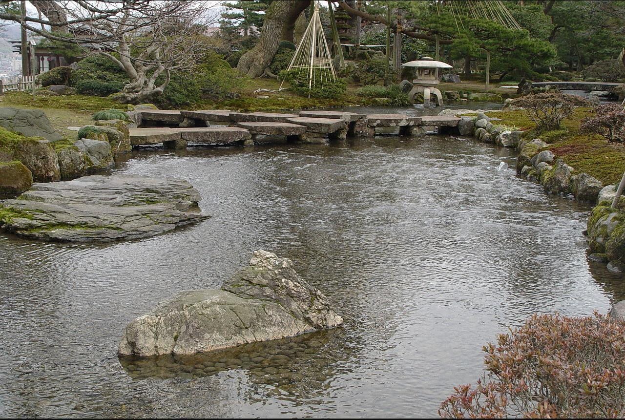 A stone lantern and stream in Kenrokuen Garden, Kanazawa — a Special Place of Scenic Beauty